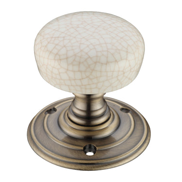 Ivory Crackle Glaze Porcelain Door Knobs, Florentine Bronze (sold in pairs)